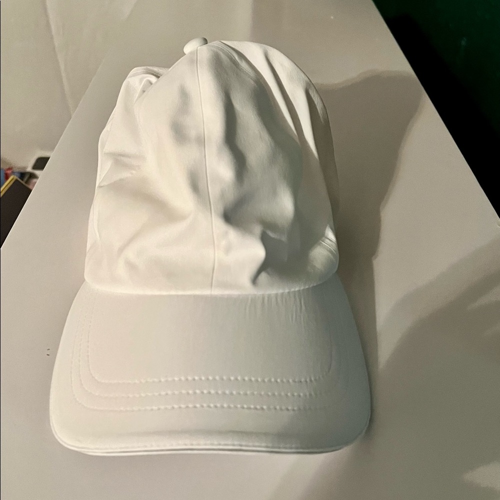 Lululemon white running hat.